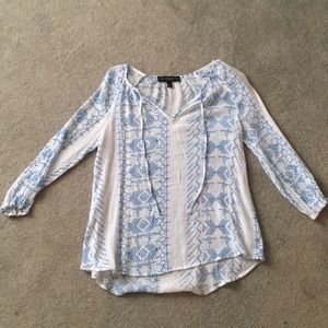 White blouse with blue designs